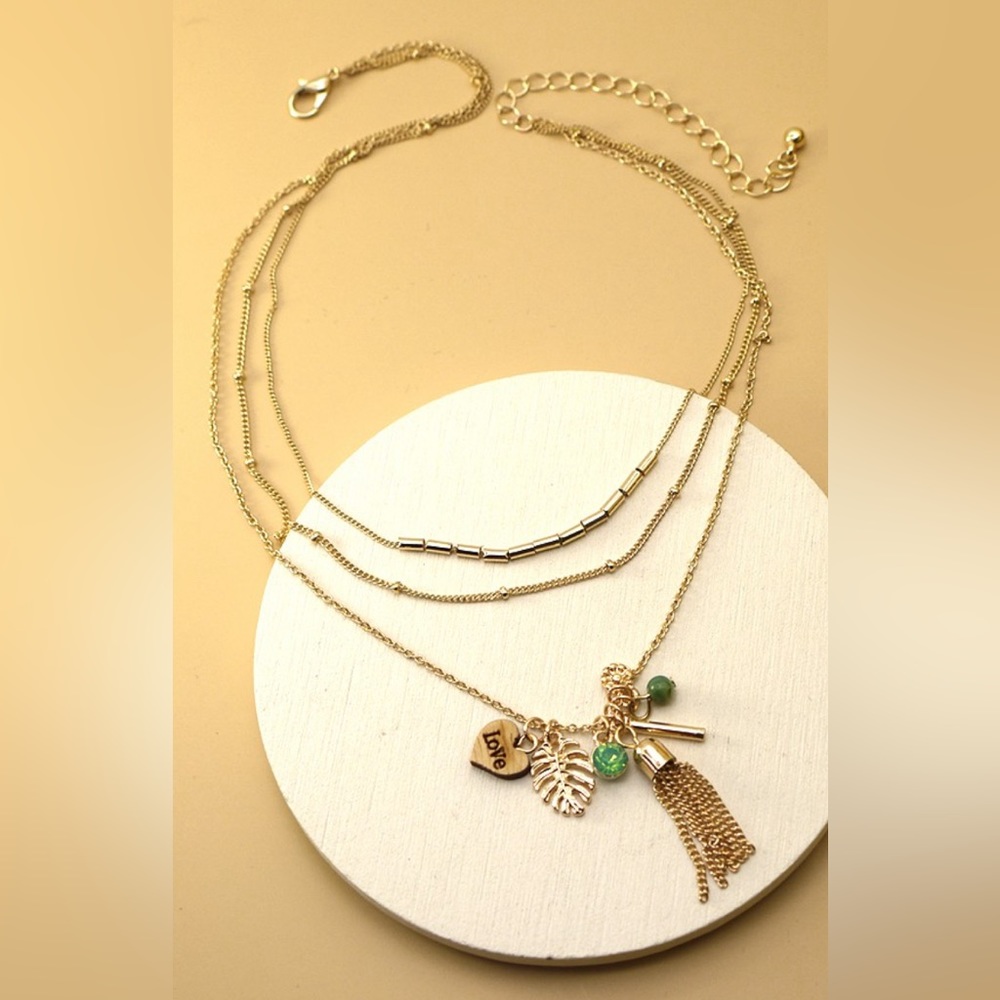 Gold cluster charm multi layer necklace